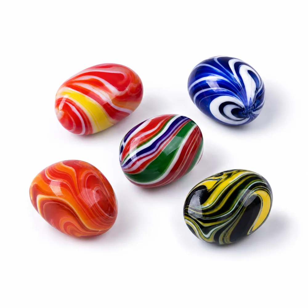 Five colorful shell-style aquarium decor stones on a white background